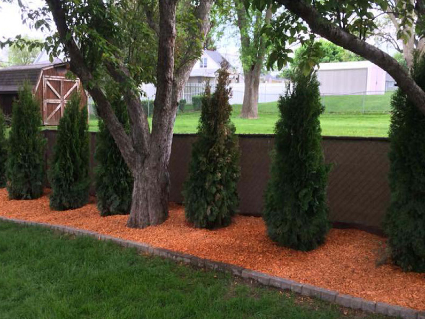 Quad Cities Mulch Installation Custom Mulching in Dubuque, IA PURA